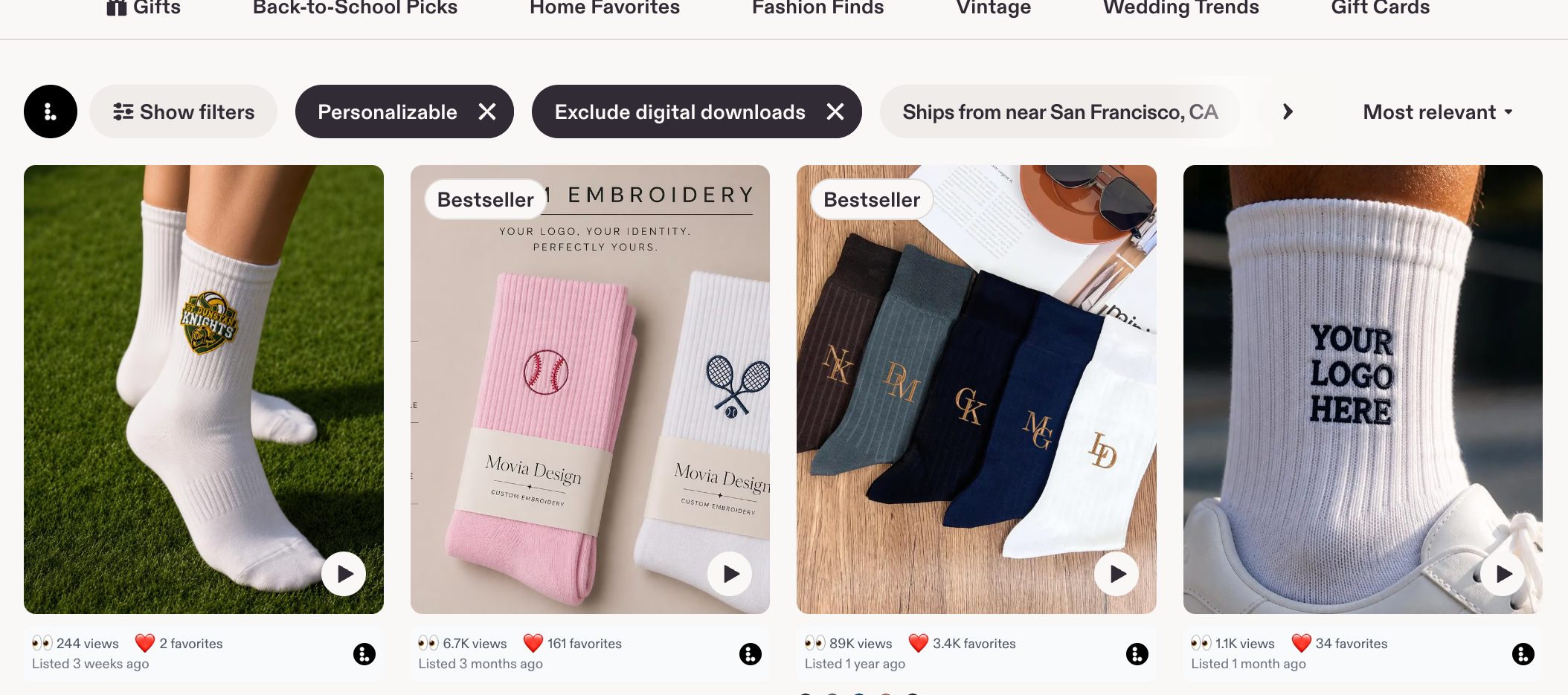 A row of Etsy sock listings with the Listadum browser extension showing views and favorites on each card.