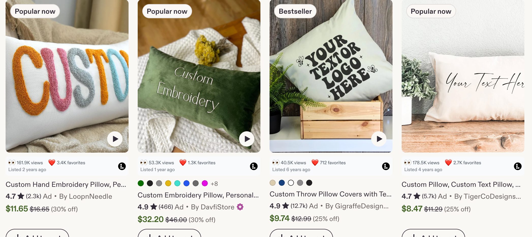 A row of Etsy throw pillow listings with the Listadum browser extension showing views and favorites on each card.